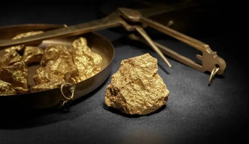 How many grams in ounce of gold?