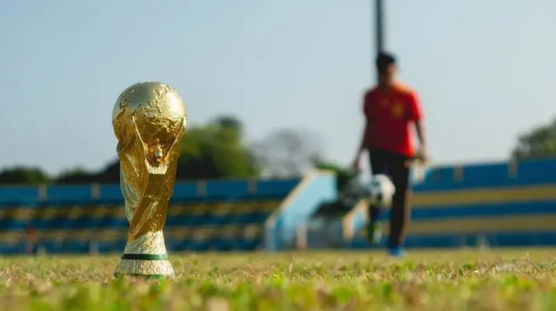 fifa world cup player on field with ball