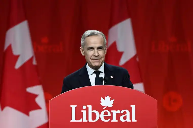 Mark Carney at a podium