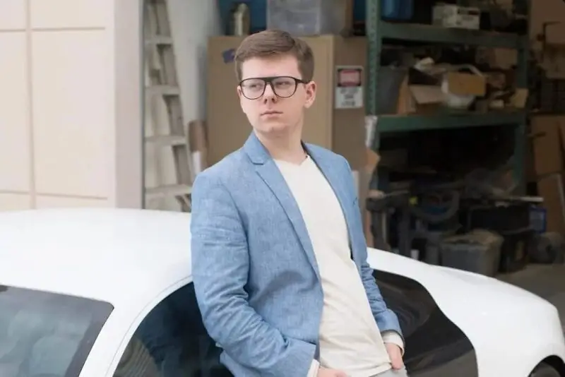 Erik Finman with Lamborghini purchased after success