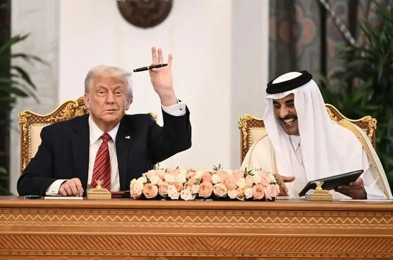 Qatar Emir reacts to Trump