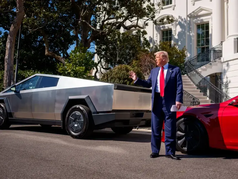 US President Donald Trump With a Tesla Amid TSLA Stock Fall