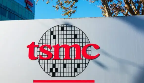 TSMC logo with wafer design on company signage