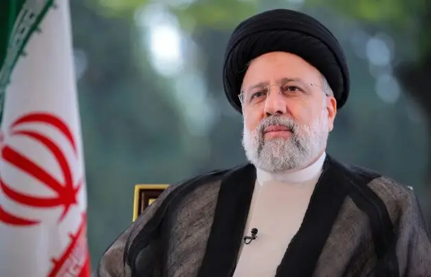 Iranian President Ebrahim Raisi in official portrait with Iranian flag