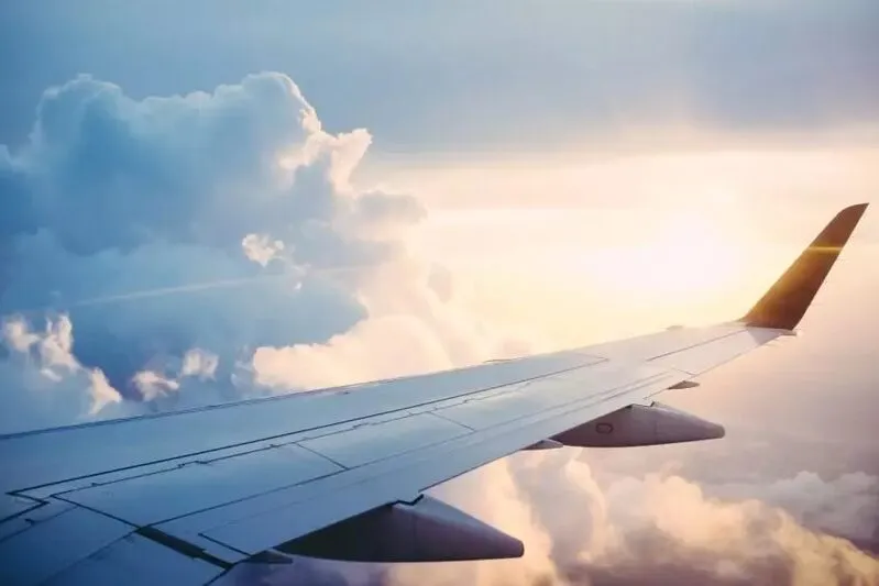 Airplane wing and sky
