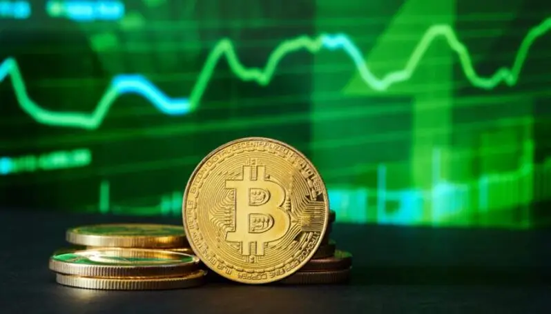 Bitcoin coin with green price chart in background