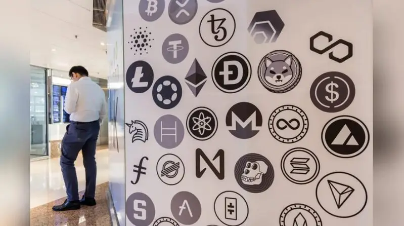 Cryptocurrency symbols on office wall China