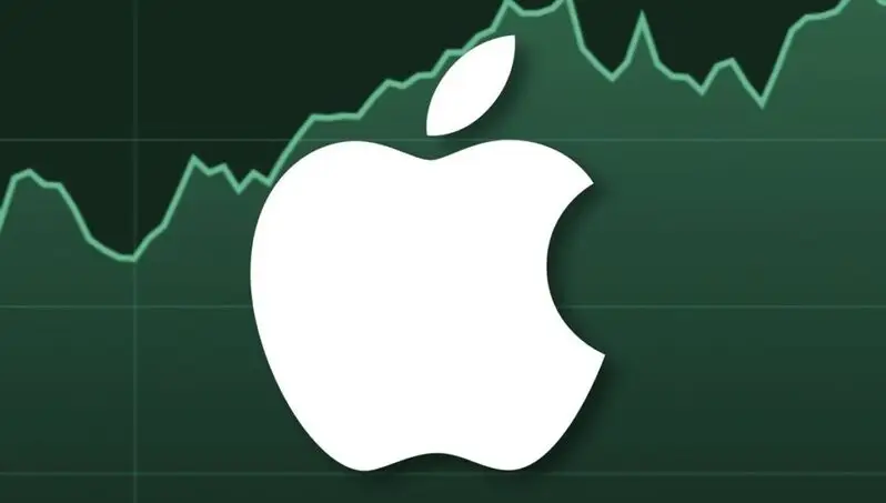 Apple logo on green stock chart with article headline