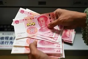 De-Dollarization Steps Up: BHP Drops USD for China’s Yuan