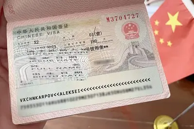 China's K-Visa vs. U.S. $100K H-1B Fee